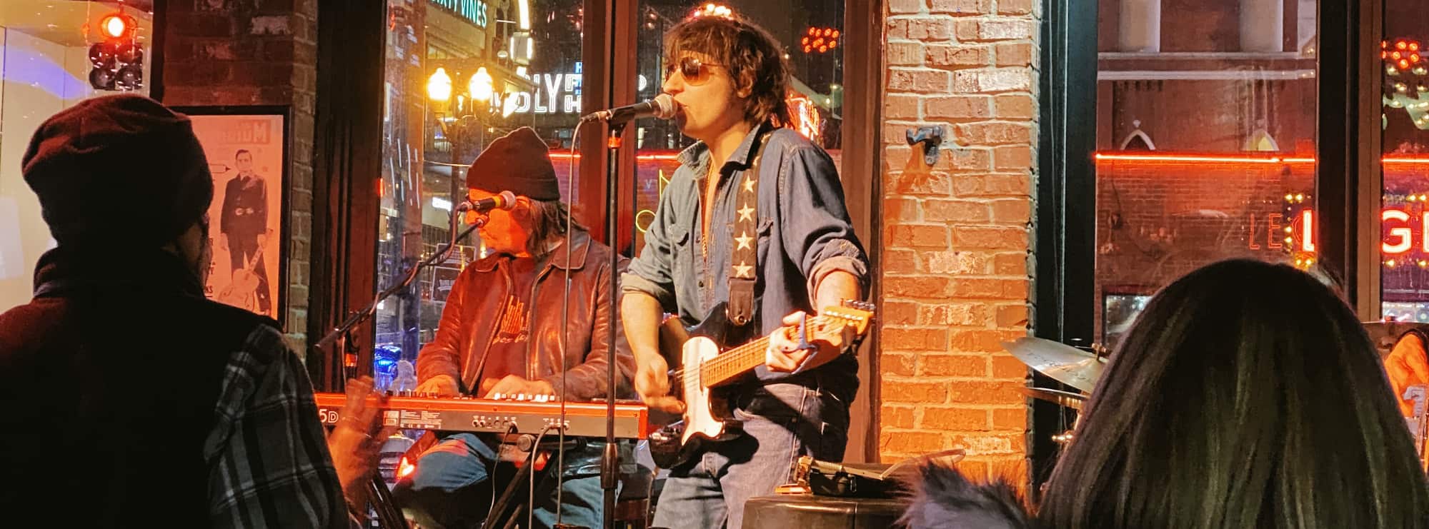 bar singer on guitar in Wilmington