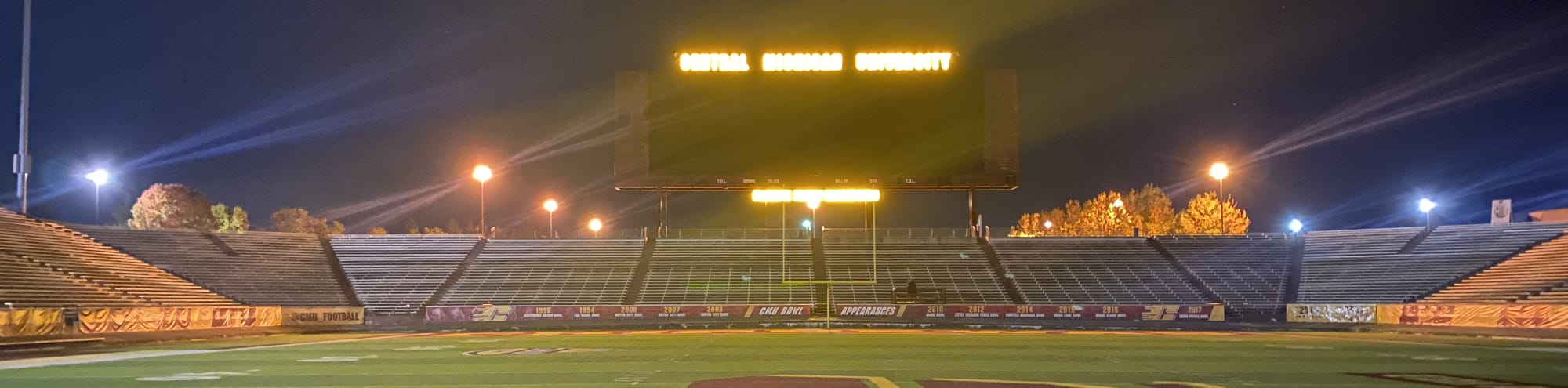 empty football stadium at night under the lights Wilmington